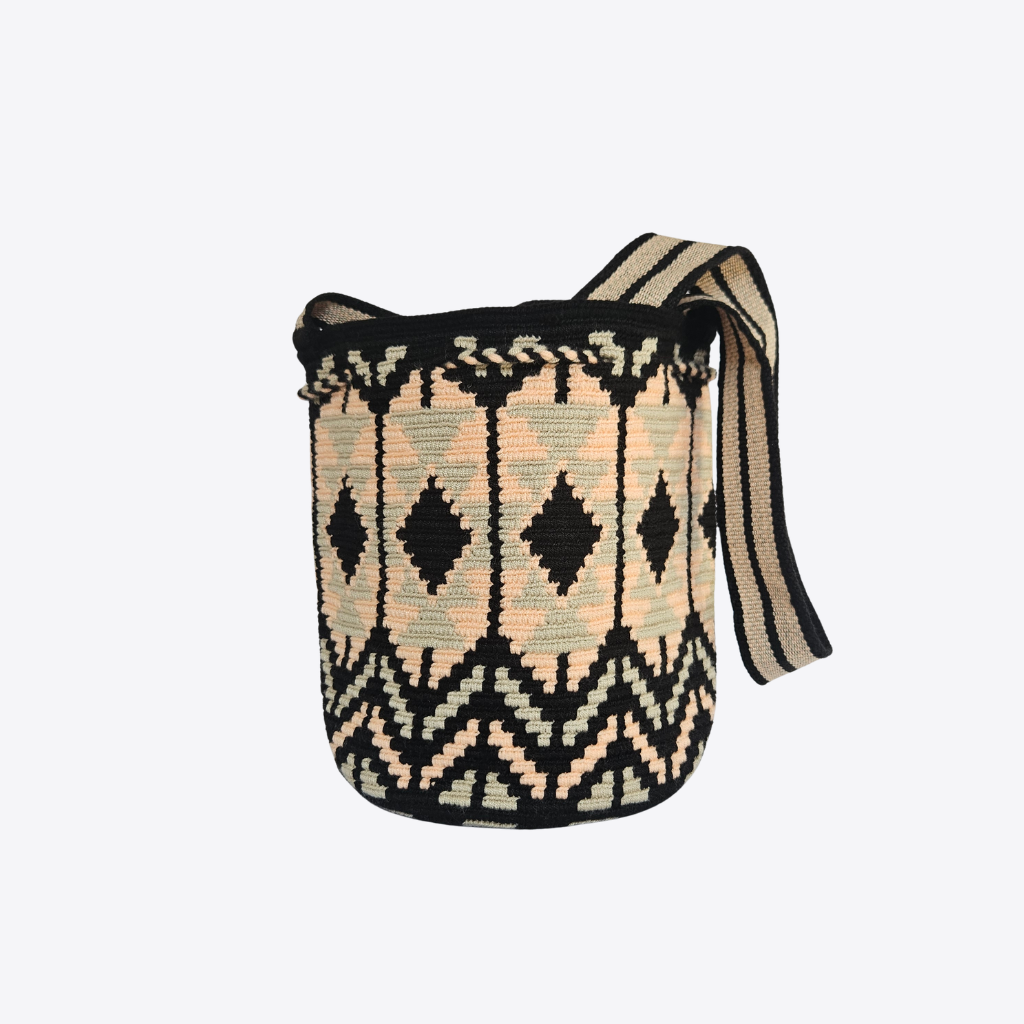 A handwoven bucket bag with a geometric pattern in black, beige, and light green, featuring a matching woven shoulder strap, shown against a plain light gray background.